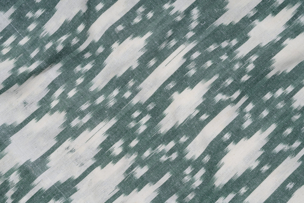
                  
                    Iris - 100% pure cotton Ikkat Fabric
                  
                