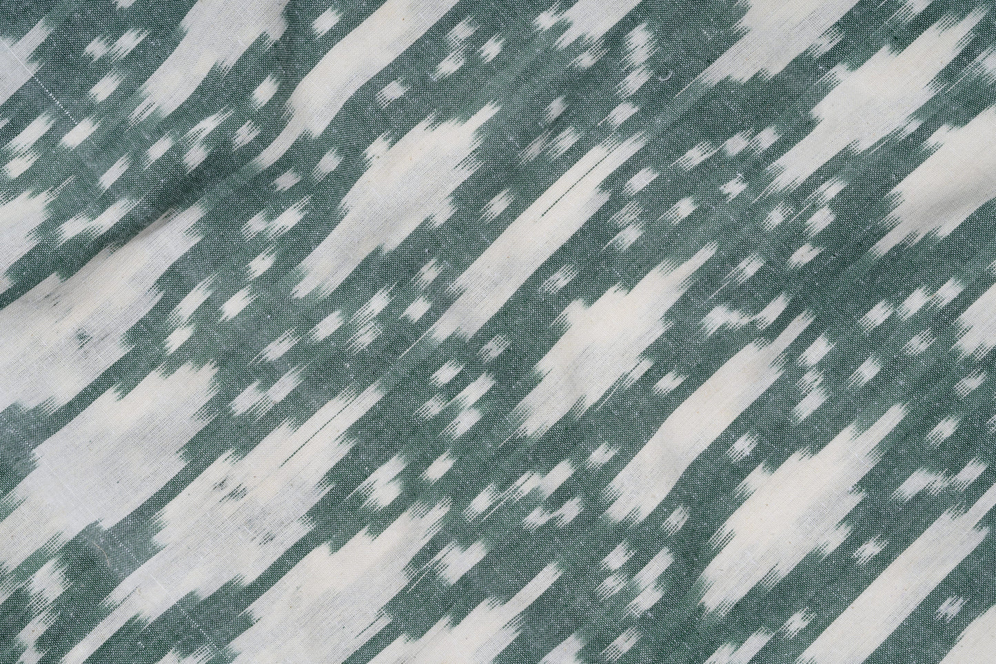 
                  
                    Iris - 100% pure cotton Ikkat Fabric
                  
                