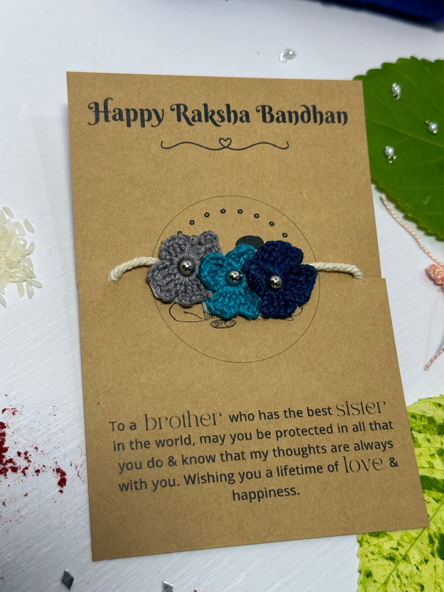 
                  
                    Blue Flora - Rakhi
                  
                