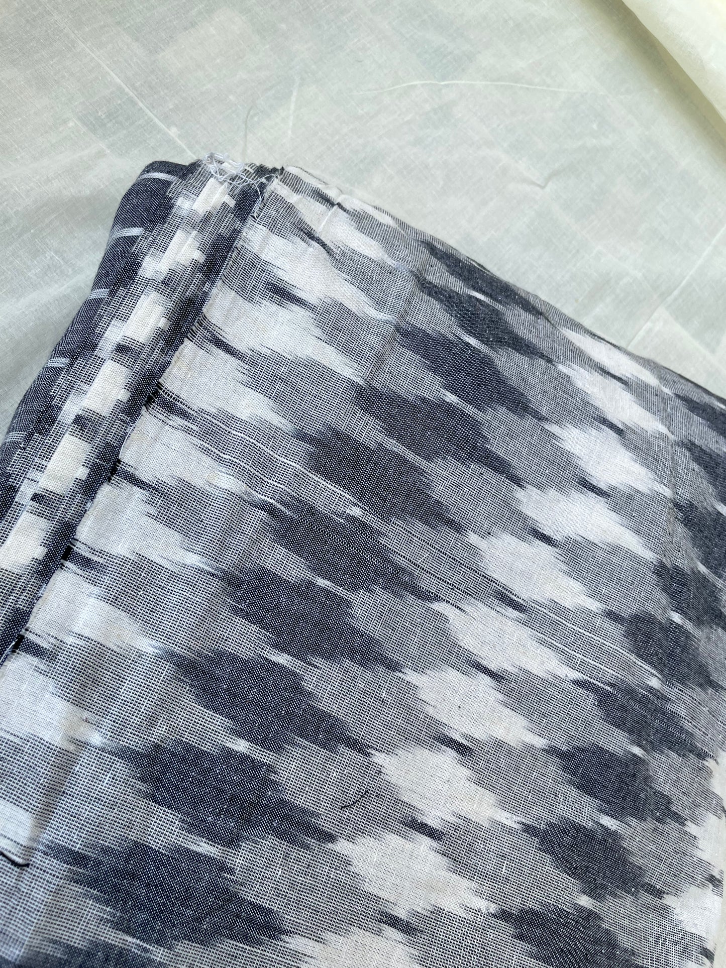 
                  
                    Hazy - 100% pure cotton Ikkat Fabric
                  
                